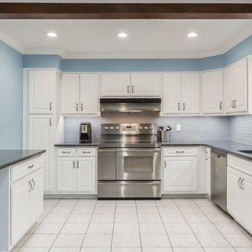 Transitional Kitchen Remodel in a Snow White Classic Square raised Door
