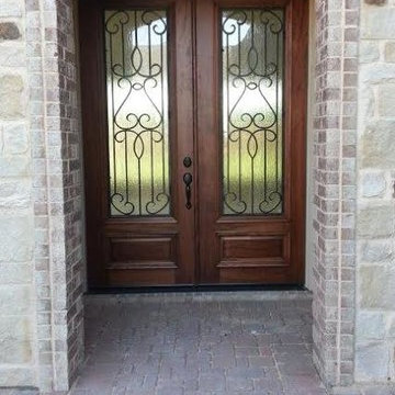 Wood Doors with Wrought Iron
