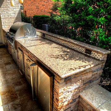 Grand home addition with outdoor kitchen see through fireplace - km