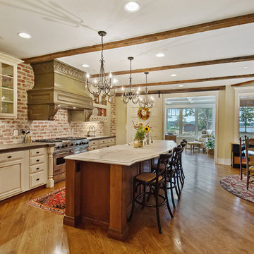 French country, lodge-style riverfront home
