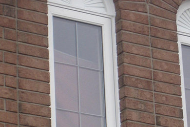 Example of a classic exterior home design in Other