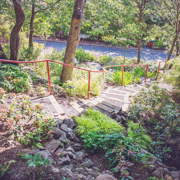 Timber + Gravel Staircase with Cobble Garden Walls
