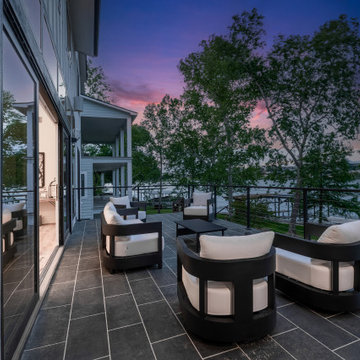 Lakefront Balcony with Modern Outdoor Seating