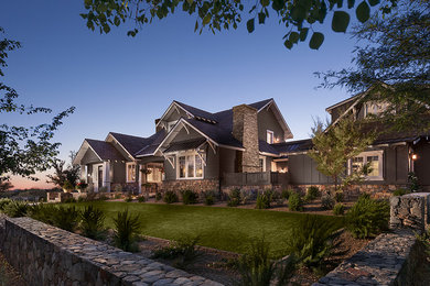 Inspiration for a large transitional gray two-story concrete fiberboard gable roof remodel in Phoenix