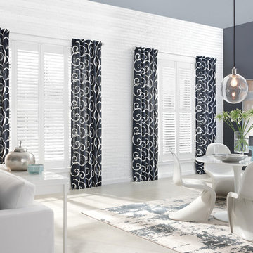 Patterned Curtains Enhance Look of These Plantation Shutters in Dining Area