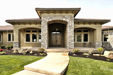 Large craftsman brown two-story mixed siding flat roof idea in Boise