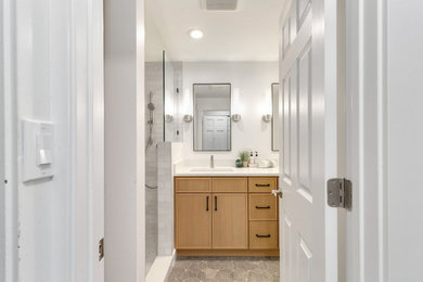 Bathroom - small transitional master double-sink bathroom idea in Seattle with shaker cabinets, medium tone wood cabinets, a drop-in sink, quartzite countertops and a built-in vanity