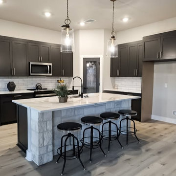 Iron Ore Kitchen with Contrasting Island & Custom Cabinetry