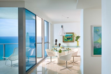 Inspiration for a coastal dining room remodel in Miami