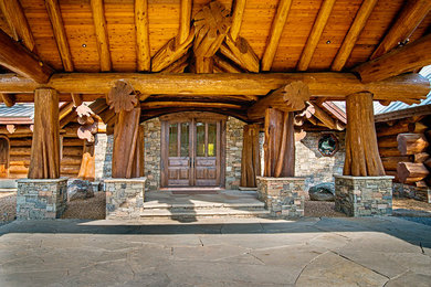 Mountain style entryway photo in Vancouver
