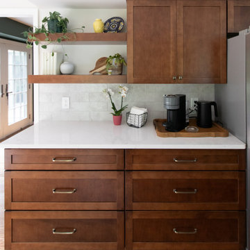 From Stark to Stylish: A Warm Kitchen Remodel with Evergreen Charm