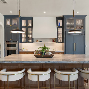 Symmetrical Modern Kitchen with Custom Hood and Integrated Appliances