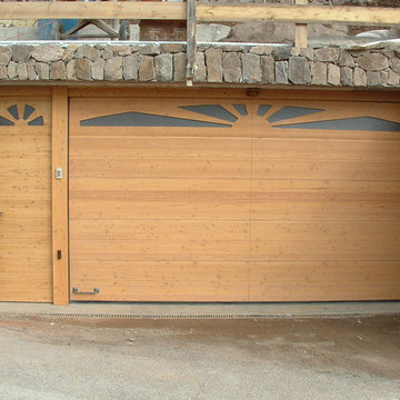 Portone garage (sezionale) con porta laterale