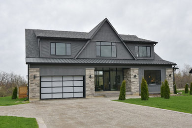 Large contemporary exterior home idea in Toronto