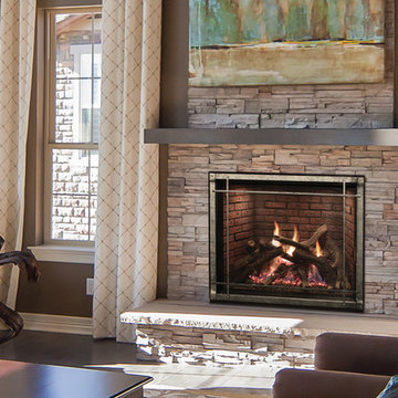 Great Room with Large Windows and Fireplace - White Mountain Hearth