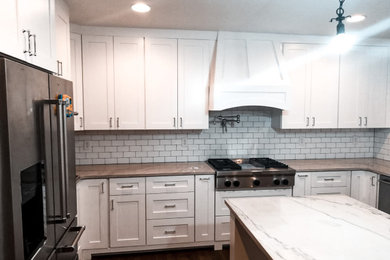 Kitchen - cottage kitchen idea in Other