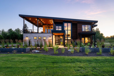 Inspiration for a contemporary mixed siding house exterior remodel in Boise