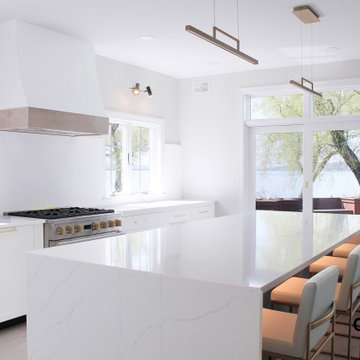 White Lakehouse Kitchen with Waterfall Countertop
