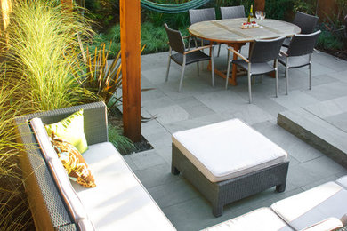 This is an example of a contemporary patio in Vancouver.