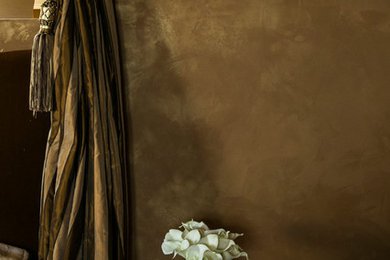 Bedroom - mediterranean guest dark wood floor bedroom idea in Bridgeport with orange walls