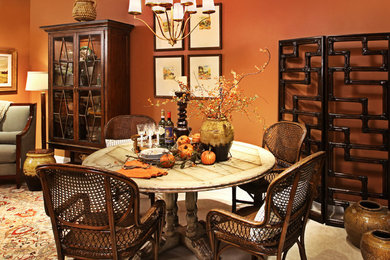 Mid-sized transitional carpeted great room photo in Detroit with orange walls and no fireplace