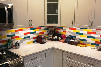 Transitional kitchen photo in Other with multicolored backsplash