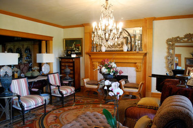 Mid-sized elegant formal and enclosed living room photo in Philadelphia with a standard fireplace and a wood fireplace surround