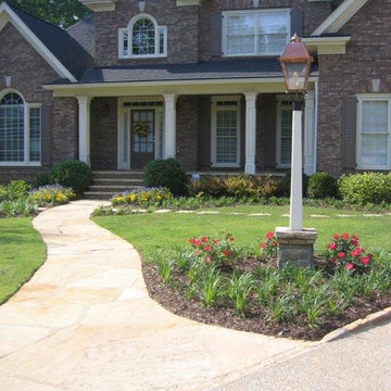 Pea Gravel drive, Fieldstone walkway and Gas lamp intersection