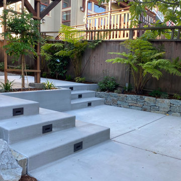 Concrete Steps Patio with stacked stone planter