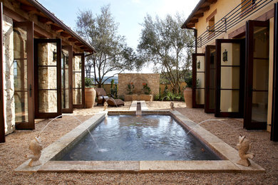Tuscan pool photo in Orange County