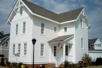 Inspiration for a mid-sized coastal white three-story concrete fiberboard exterior home remodel in Other