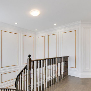 Wainscoting, baseboards, crown moulding, waffle ceilings