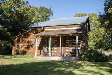 Small rustic exterior home idea in Austin