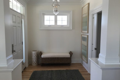 Example of a beach style entryway design in Raleigh