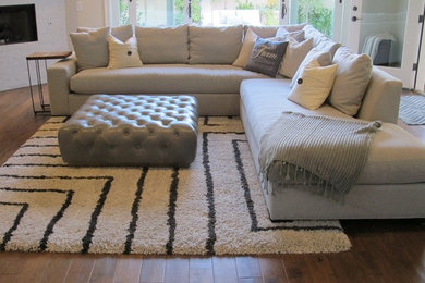 Example of a transitional living room design in Other