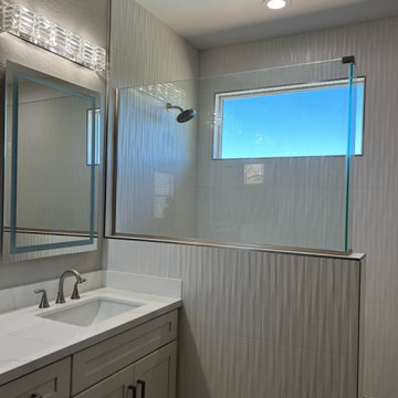 White Guest Bathroom & Master Suite Remodel Featuring 3D Tile