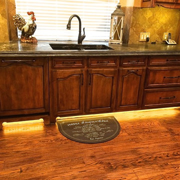Sink base with lighted toe kick