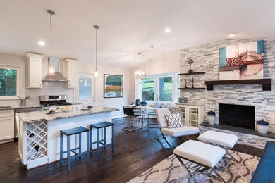 Example of a mid-sized minimalist l-shaped dark wood floor and brown floor eat-in kitchen design in DC Metro with a single-bowl sink, recessed-panel cabinets, white cabinets, marble countertops, white backsplash, ceramic backsplash, stainless steel appliances and an island