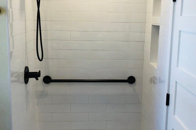 Mid-sized transitional 3/4 white tile and ceramic tile ceramic tile, beige floor and single-sink bathroom photo in Minneapolis with beaded inset cabinets, green cabinets, a two-piece toilet, yellow walls, a vessel sink, granite countertops, green countertops and a freestanding vanity