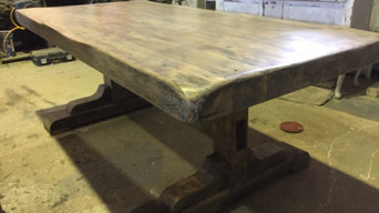 This is a table we have made from reclaimed timber sourced less than a mile away
