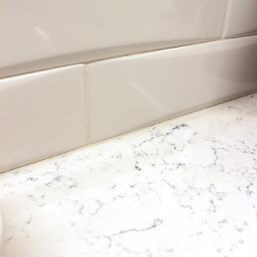 Waypoint Painted Linen Cabinets with Zodiaq Blue Carrara Quartz Countertop