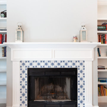 White Fireplace with Blue Pattern Tile Surround and Built-In Shelving – Ipswich