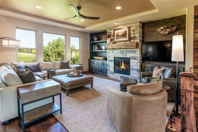Example of a transitional living room design in Denver