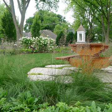 Prairie Dropseed Grass Borders Exploded Flagstone Patio