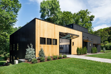 Example of a mid-sized urban one-story exterior home design in Minneapolis