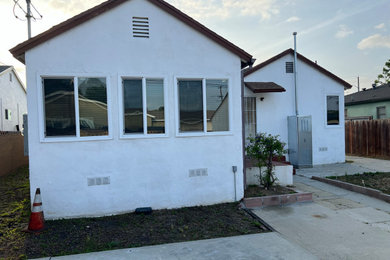 Sandblasting, Repair Cement Cracks, New Stucco and Paint