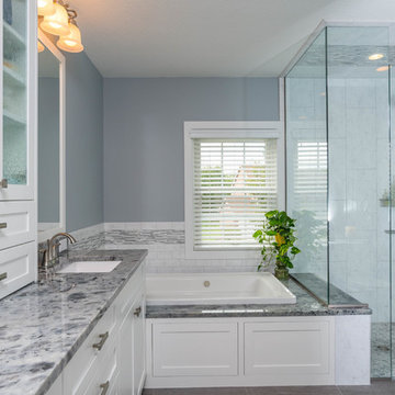 Contemporary Primary Spa Bath With Kohler Archer BubbleMassage Air Bath Tub