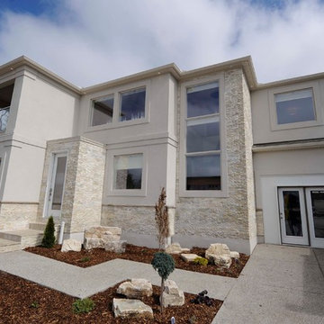 Contemporary Exterior with Light Natural Stacked Stone