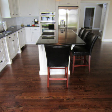 Aquebogue new construction - 3 1/4" Red Oak installed / stained Special Walnut
