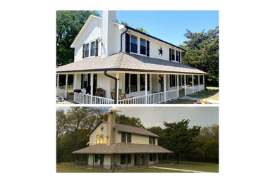 Inspiration for a large cottage white two-story wood house exterior remodel in Austin with a shingle roof and a brown roof